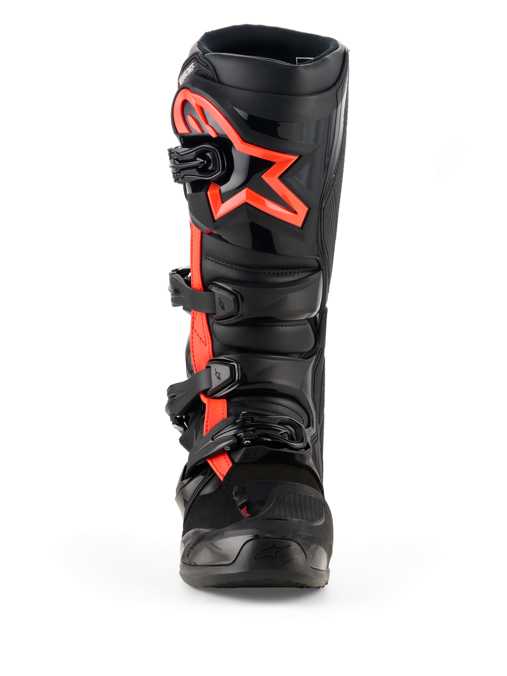 Bottes Alpinestars Tech 7, bottes de motocross, noir et rouge fluo, vue de face, avec un grand logo étoile Alpinestars rouge fluo sur la plaque tibiale, système de fermeture à quatre boucles et construction en TPU durable conçue pour la course tout-terrain