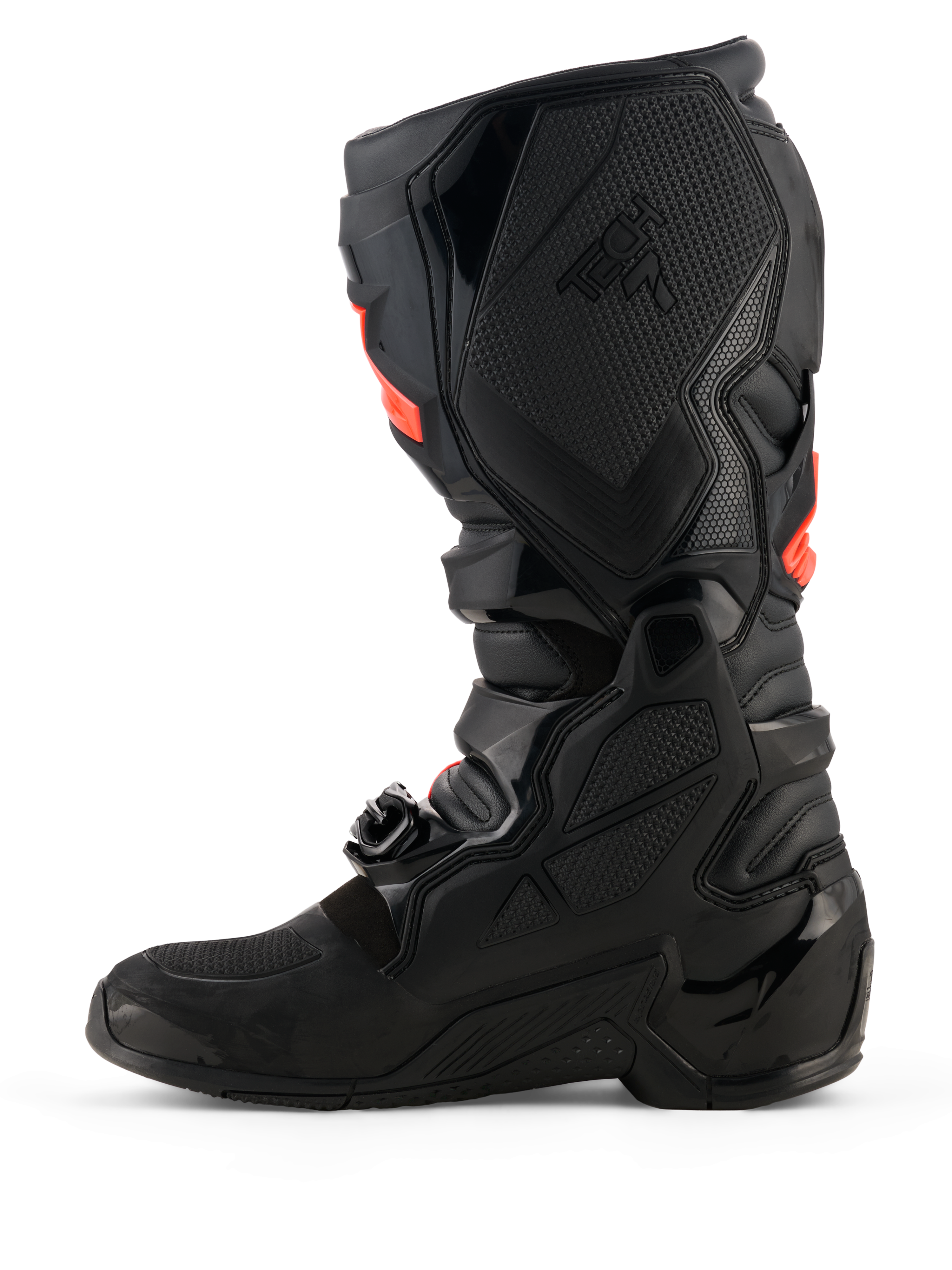 Bottes Alpinestars Tech 7, bottes de motocross, noires avec accents rouge fluo, vue de profil intérieur présentant les coques de protection en TPU, le système de boucles et les panneaux de grip texturés pour des performances tout-terrain