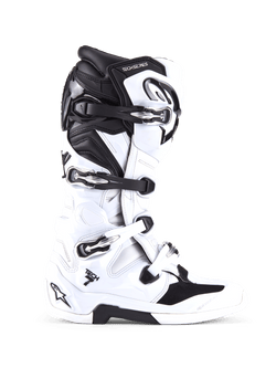 Bottes Alpinestars Tech 7, bottes de motocross tout-terrain, blanches et noires, dotées de quatre boucles réglables et d'une coque en TPU renforcée, profil latéral de bottes tout-terrain professionnelles