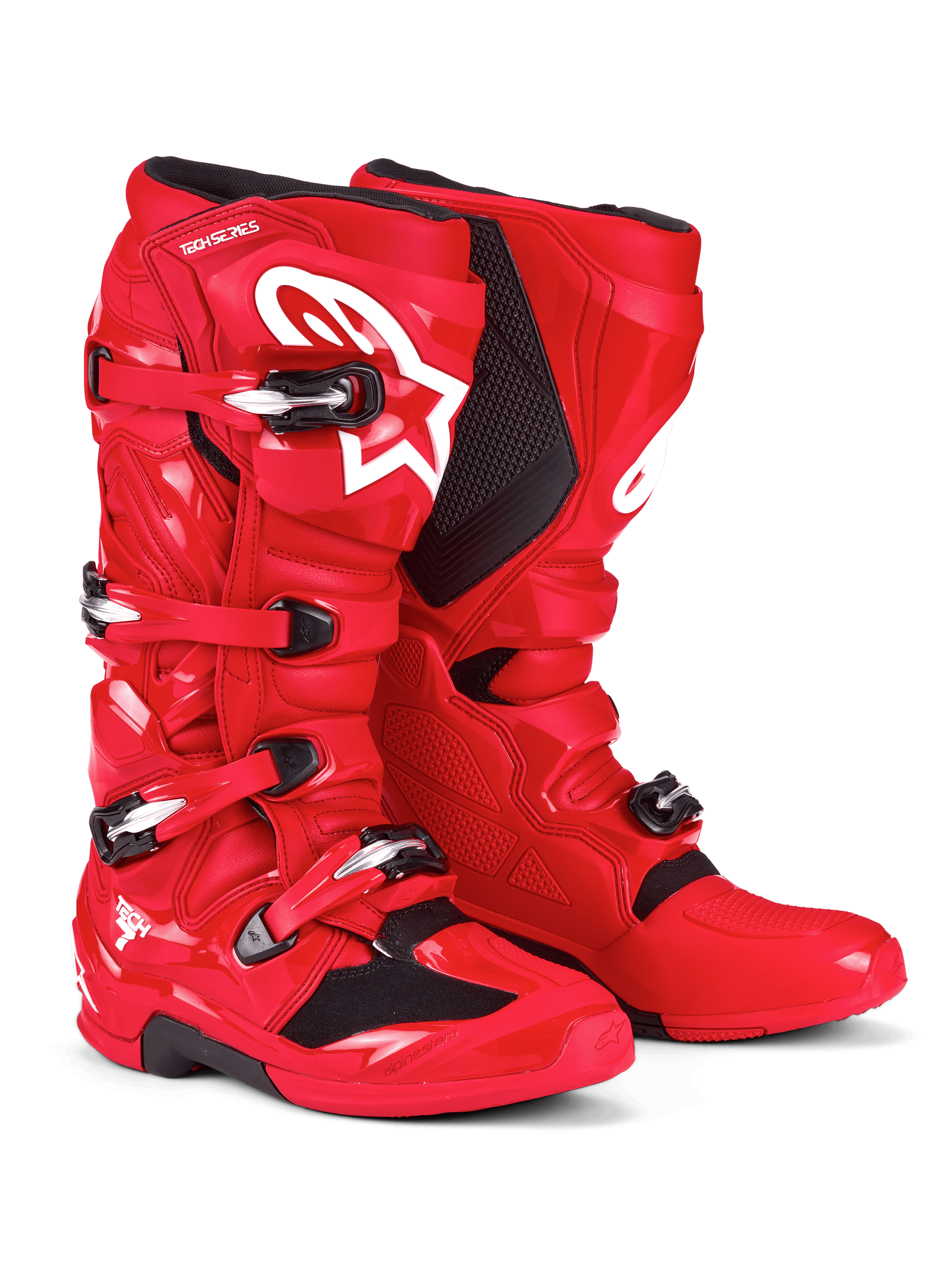 Bottes Alpinestars Tech 7, bottes de motocross, rouge vif, avec logo Astars blanc sur le tibia, système de fermeture à boucles argentées et noires, et coque de protection en TPU pour des performances tout-terrain