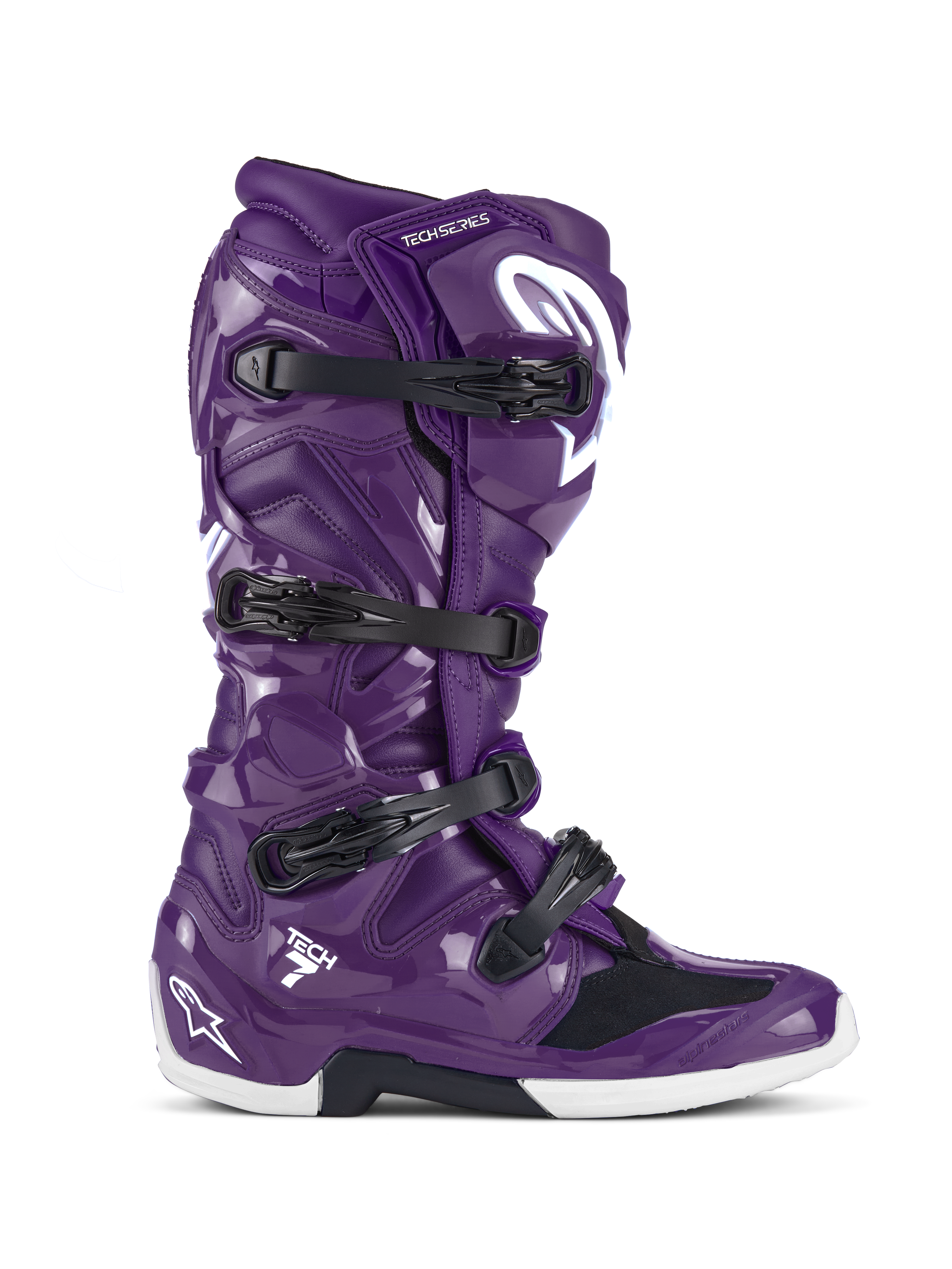 Alpinestars Tech 7 laarzen, motorcross- en off-roadlaarzen, glanzend paars met zwarte gespen en witte accenten, zijaanzicht, sluitsysteem met vier gespen, wit Star-logo op de hiel en het scheenbeen, duurzame TPU-constructie voor off-road prestaties