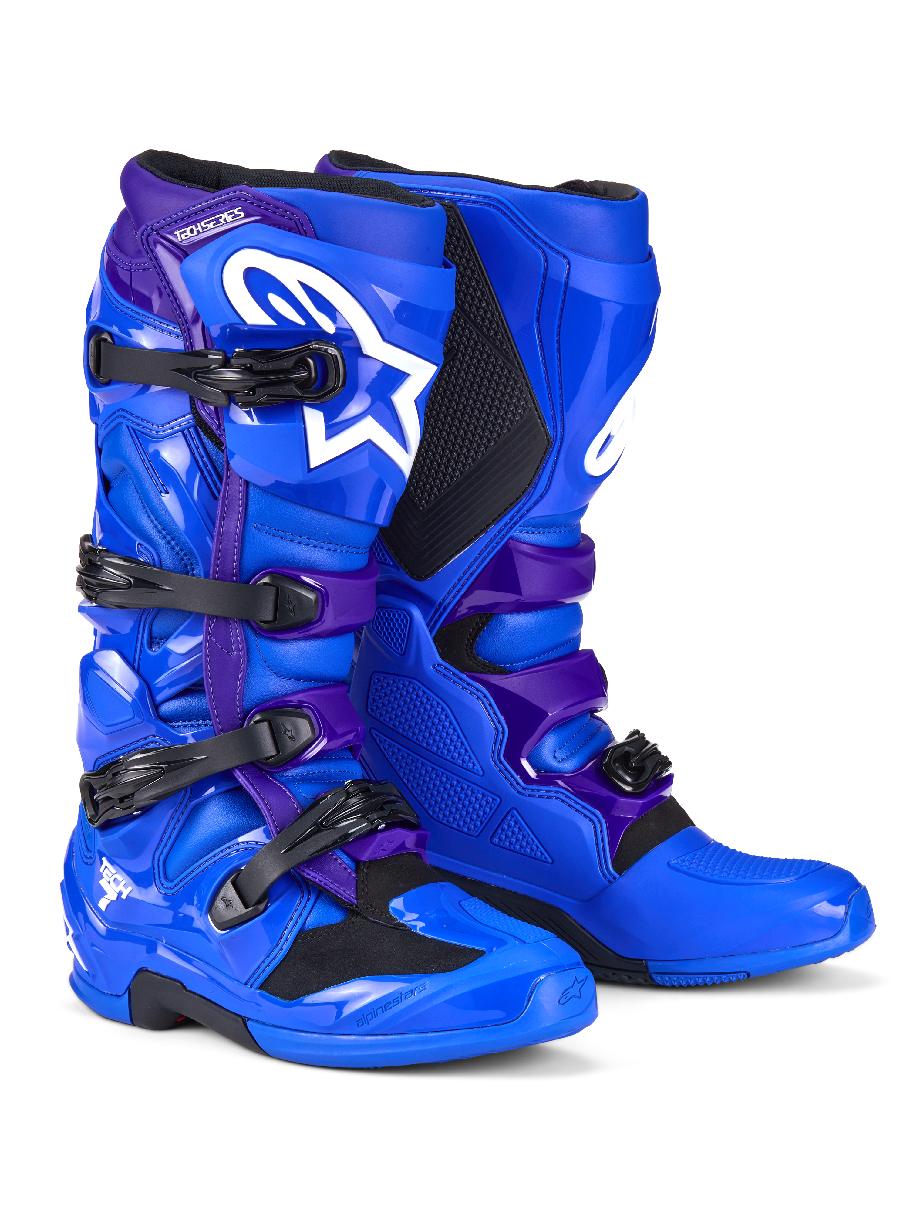 Alpinestars Tech 7 laarzen, motorcrosslaarzen, blauw en paars, met witte Alpinestars-logo's, TPU-beschermingspanelen, sluitingssysteem met vier gespen en robuust off-road zoolontwerp