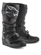 Bottes Alpinestars Tech 7 Enduro, bottes de motocross et tout-terrain, noires avec logo Alpinestars blanc, dotées de quatre boucles réglables, plaque tibiale en TPU et semelle durable spécifique à l'enduro.