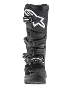 Bottes Alpinestars Tech 7 Enduro, bottes de motocross et d'enduro, noires, vue de face présentant un logo d'étoile blanche sur le tibia, système de fermeture à quatre boucles et structure de protection renforcée pour usage tout-terrain
