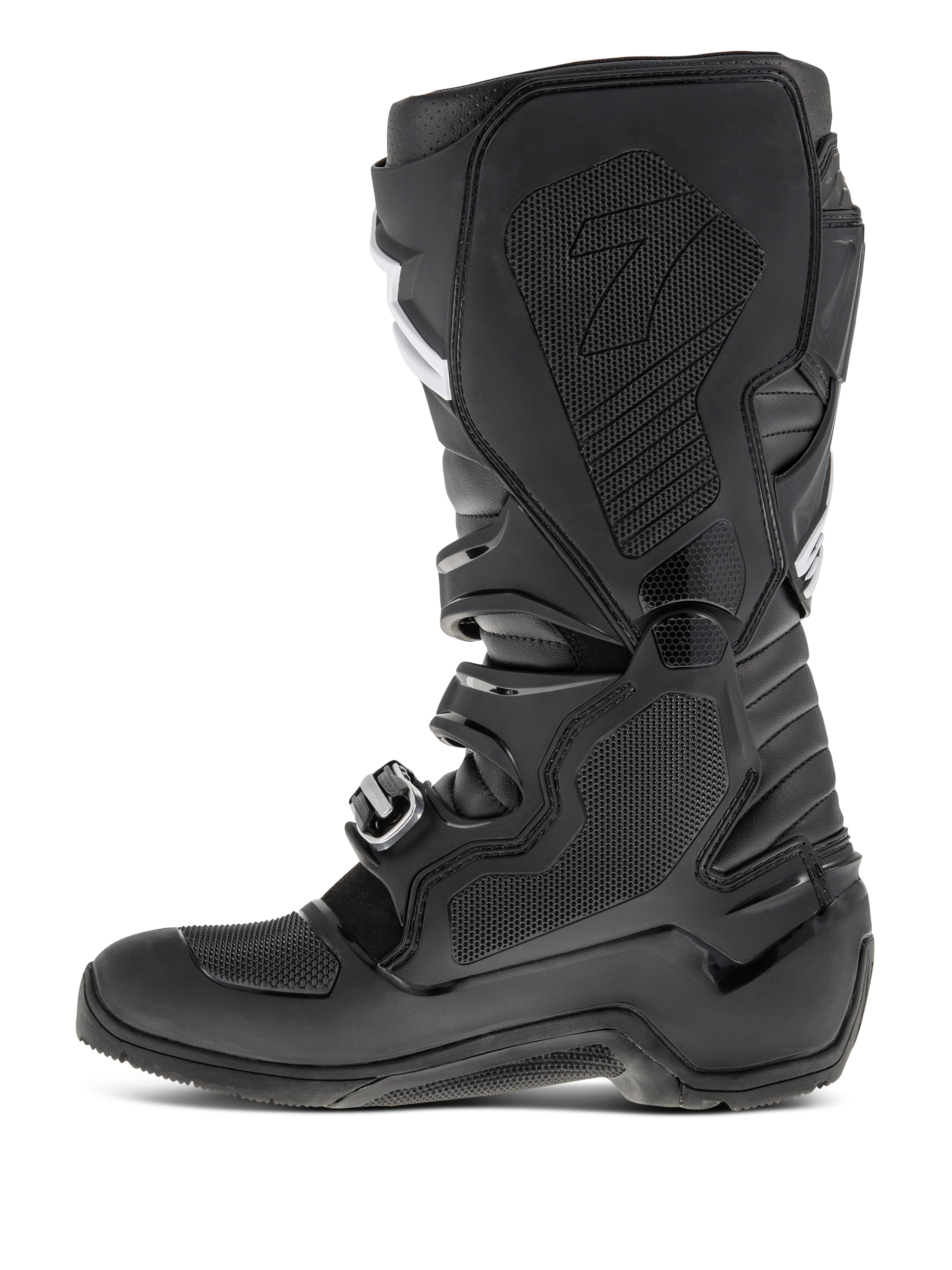 Bottes Alpinestars Tech 7 Enduro, Noir, vue de profil mettant en évidence la face médiale avec insert en caoutchouc alvéolé, panneaux de protection en TPU et système de fermeture à boucles pour la performance motocross tout-terrain