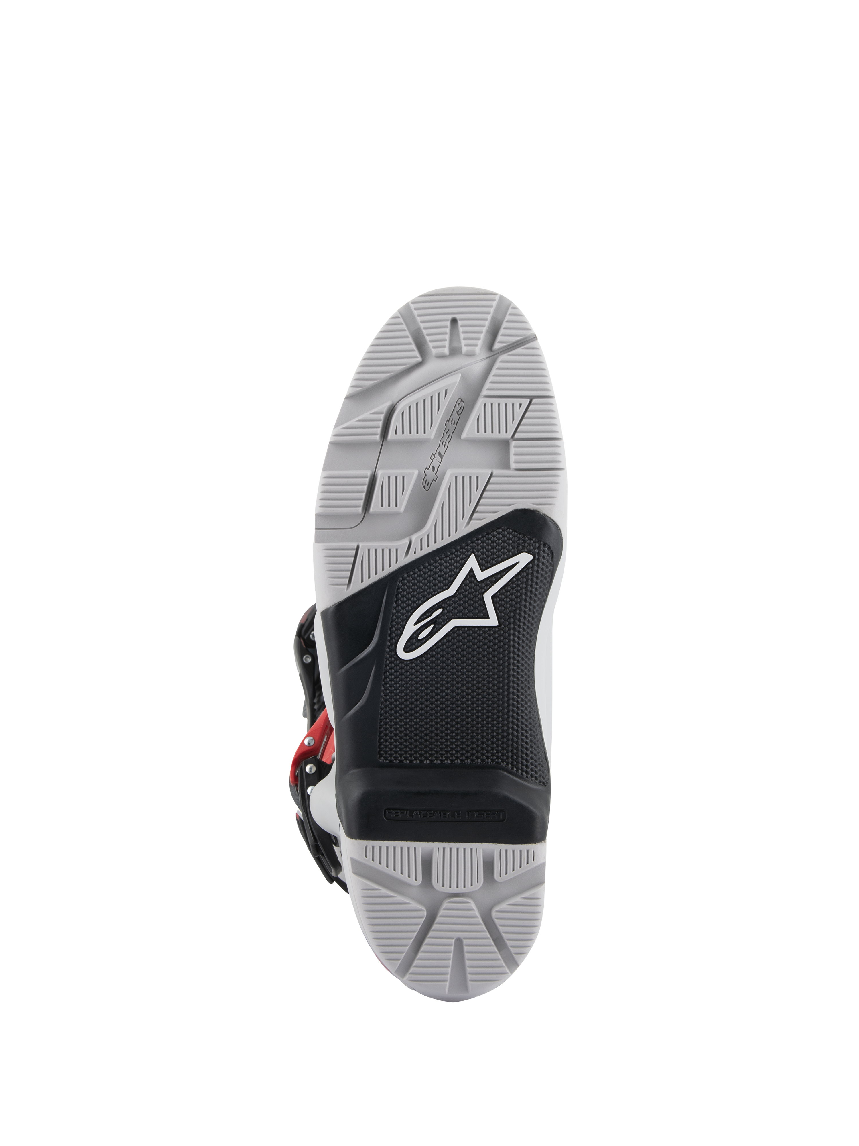 Bottes Alpinestars Tech 7 Enduro, vue de la semelle extérieure, semelle bi-composant grise et noire avec logo étoile blanc, crampons profonds pour une adhérence maximale en tout-terrain, insert de repose-pied remplaçable conçu pour la durabilité en enduro et tout-terrain
