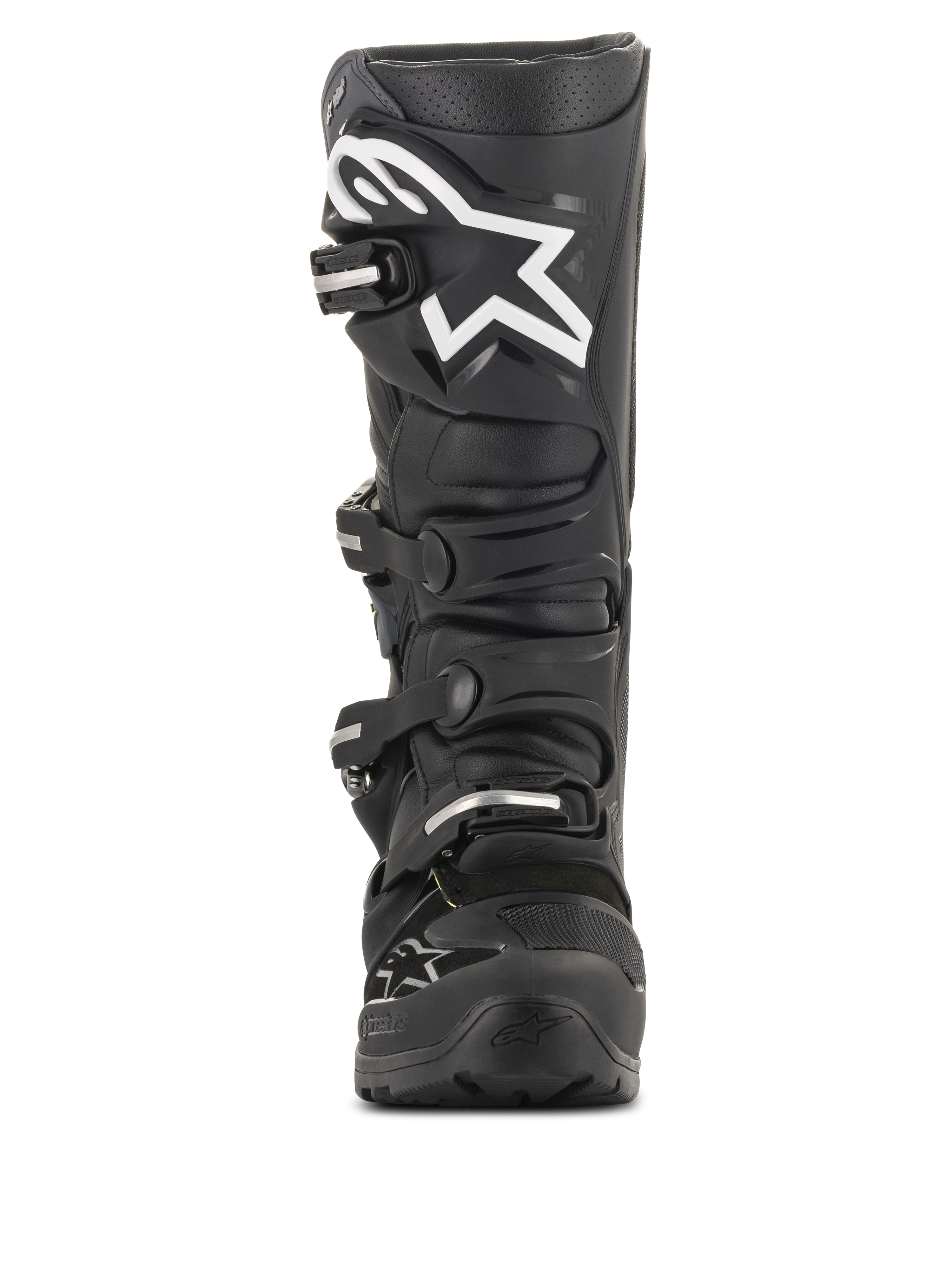 Bottes Alpinestars Tech 7 Enduro Drystar®, bottes de motocross noires, vue de face avec un grand logo étoile blanc sur le tibia, système de fermeture à quatre boucles, construction robuste en TPU pour l'enduro et le tout-terrain