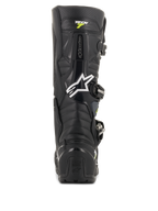 Bottes Alpinestars Tech 7 Enduro Drystar, bottes de motocross noires et grises, vue arrière présentant le logo Alpinestars blanc et le marquage 'Tech 7', protection robuste du talon en TPU et construction renforcée pour une durabilité tout-terrain