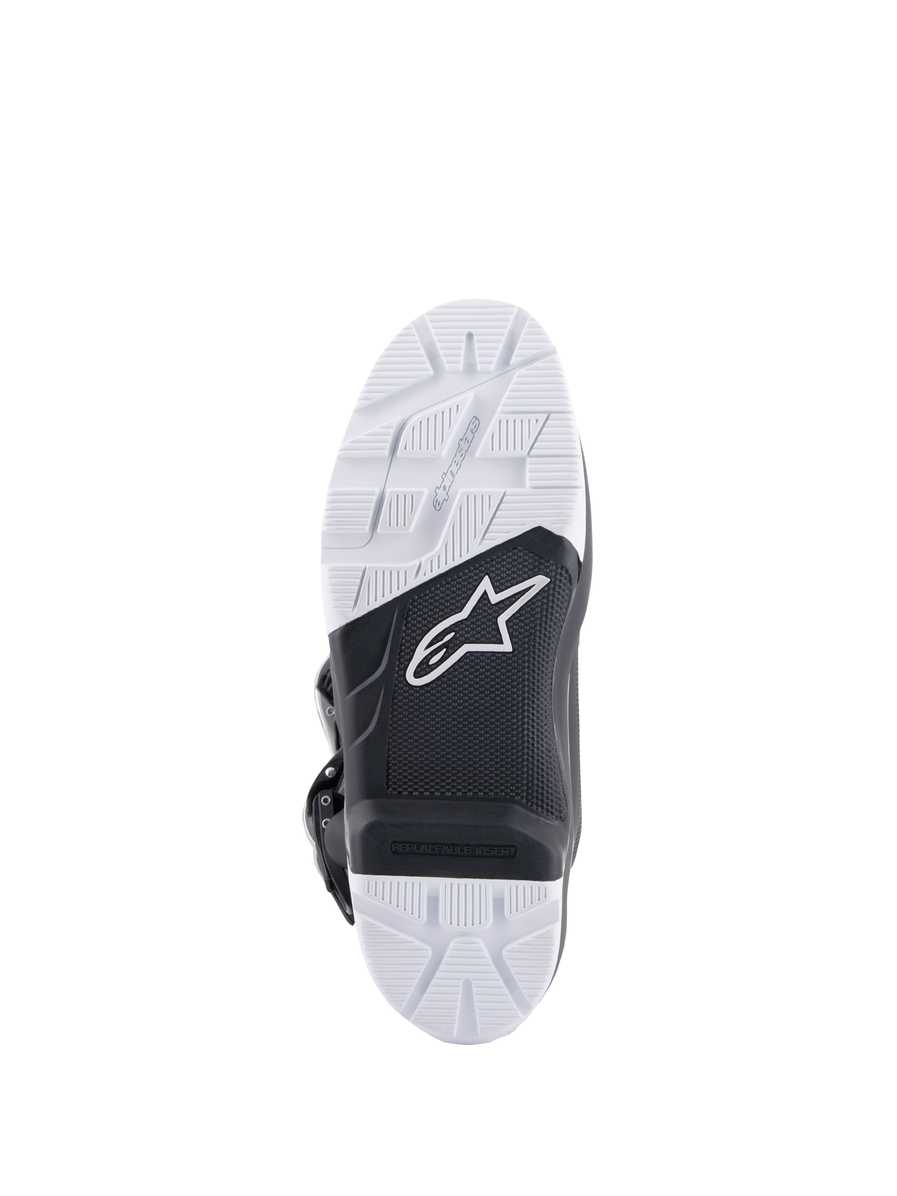 Alpinestars Tech 7 Enduro Drystar® laarzen, detailaanzicht van de zool, zwart en witte rubbercompound met dubbele dichtheid en hoge grip, voorzien van het Alpinestars-logo en vervangbaar voetsteun-inzetstuk, ontworpen voor off-road en enduro tractie.