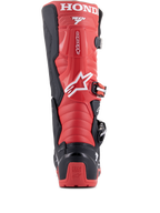 Bottes Alpinestars Honda Tech 7 Enduro Drystar®, noir et rouge vif, vue arrière présentant le marquage HONDA sur le haut du mollet, une protection de talon en TPU avec logo Tech Series et un système de fermeture à boucles sécurisé.