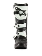 Alpinestars Tech 3 laarzen, motorcrosslaarzen, zwart en wit, vooraanzicht met witte TPU-scheenplaat met zwart sterlogo en witte gespriemen, duurzaam off-road schoeisel