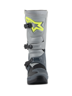 Alpinestars Tech 3 laarzen, motorcrosslaarzen, donkergrijs, lichtgrijs en zwart, vooraanzicht met een felgeel logo op de scheenplaat, drie zwarte polymeer gespen en een duurzame TPU-schaal voor off-road racen
