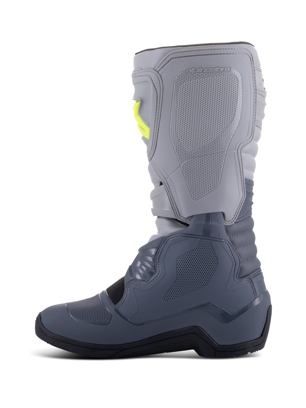 Alpinestars Tech 3 laarzen, motorcrosslaarzen, donkergrijs, lichtgrijs en zwart, zijaanzicht met lichtgrijze bovenkant en donkergrijze onderkant met gele gespaccenten, TPU-beschermingsplaten en een duurzame zwarte zool.