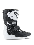 Bottes Alpinestars Kids Tech 3S, bottes de motocross pour enfants, blanc et noir, vue latérale montrant le design montant, système de fermeture à boucles et sangles, plaque de tibia protectrice en TPU et semelle blanche, chaussures de moto tout-terrain pour enfants