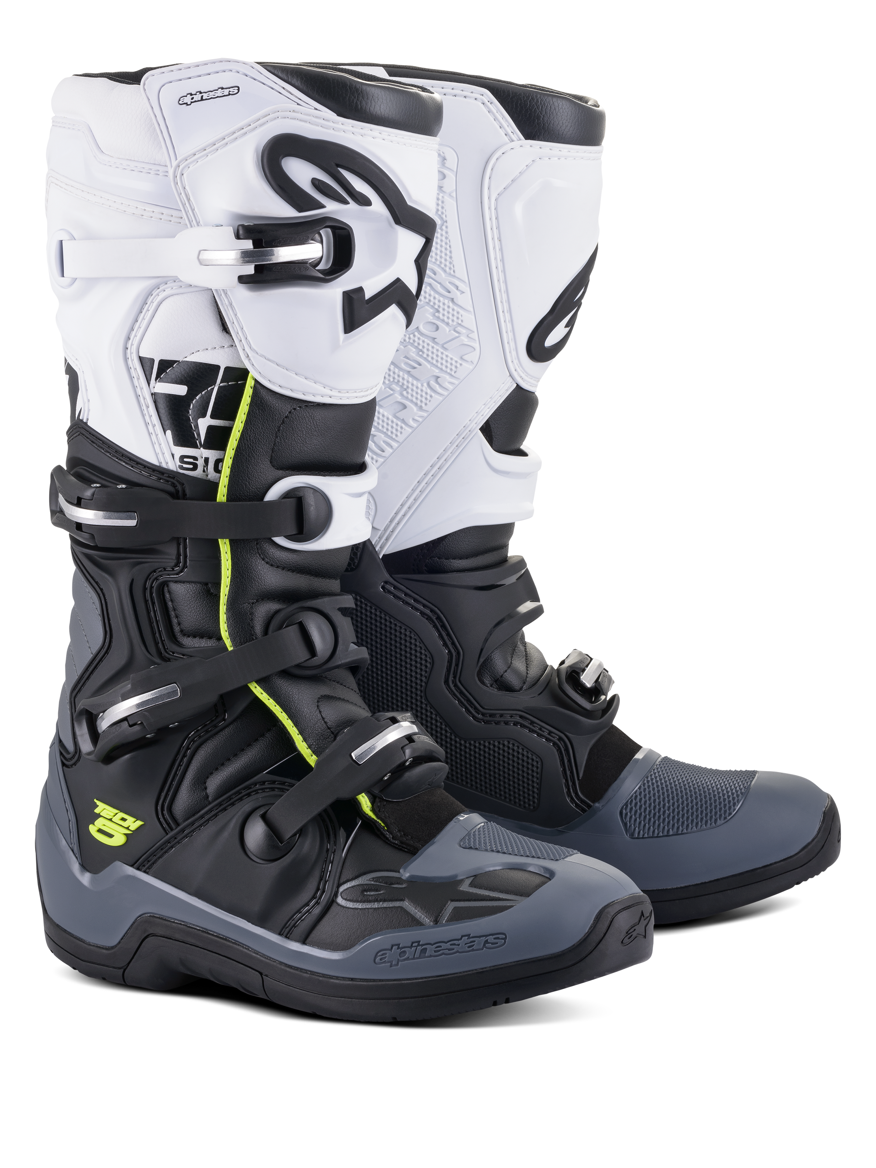 Bottes Alpinestars Tech 5, bottes de motocross et tout-terrain, noir, gris foncé et blanc, avec des accents jaune fluo, système de fermeture à quatre boucles, panneau supérieur blanc avec logo Astars noir, protection des orteils et du talon gris foncé, et construction en microfibre durable