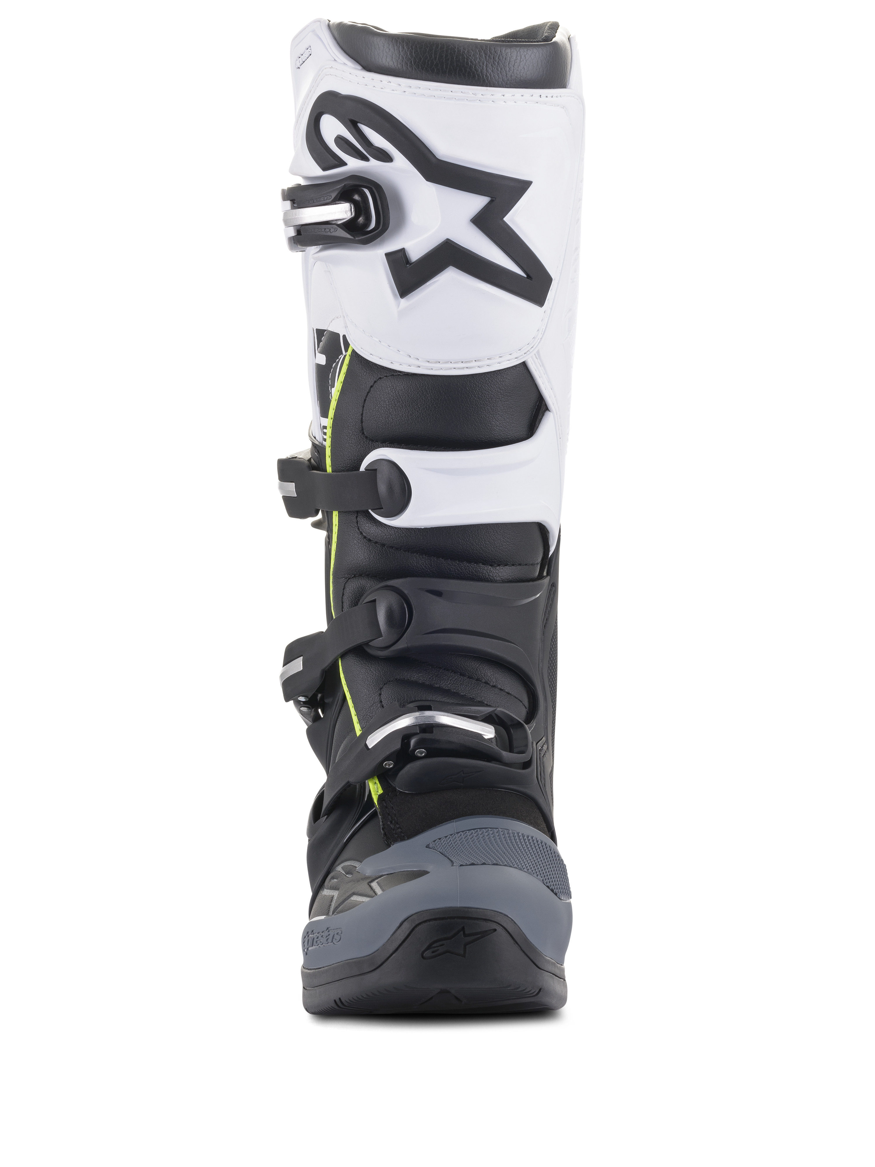 Bottes Alpinestars Tech 5, bottes de motocross, noir, gris foncé et blanc, vue de face présentant un système de fermeture à boucles multiples, panneau supérieur blanc avec logo Astars noir, bout renforcé gris foncé et discrets accents jaunes