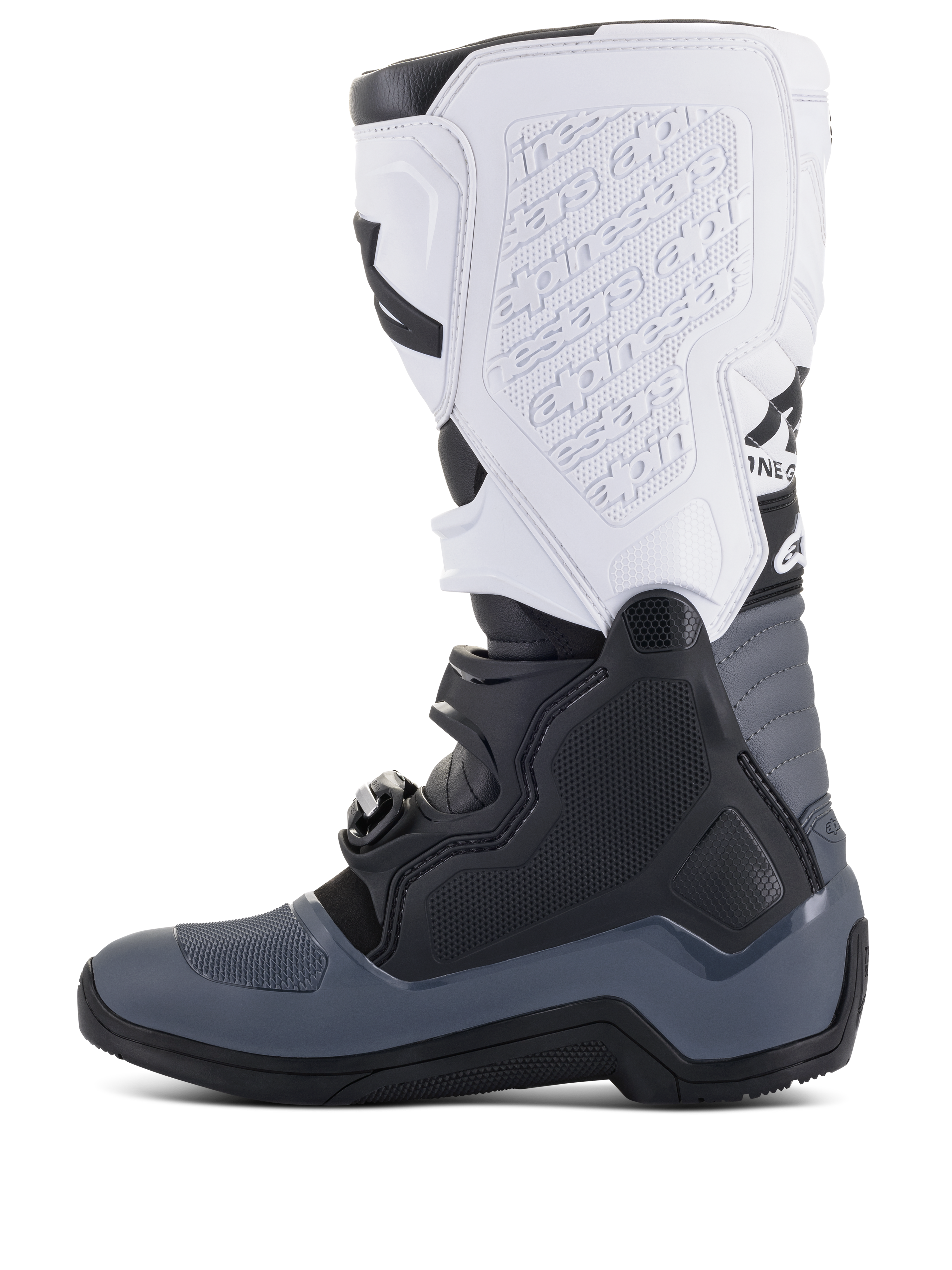 Bottes Alpinestars Tech 5, bottes de motocross, noir, gris foncé et blanc, vue de profil avec plusieurs fermetures à boucles, marquage en relief sur la plaque protège-tibia blanche et construction robuste pour la performance tout-terrain