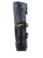 Alpinestars Tech 5 laarzen, motorcrosslaarzen, zwart, koel grijs en fluoriserend geel, achteraanzicht met accordeon-flexzones en hielbescherming, voorzien van geel Astars-logo en Tech Series-reliëf, duurzame constructie voor off-road prestaties