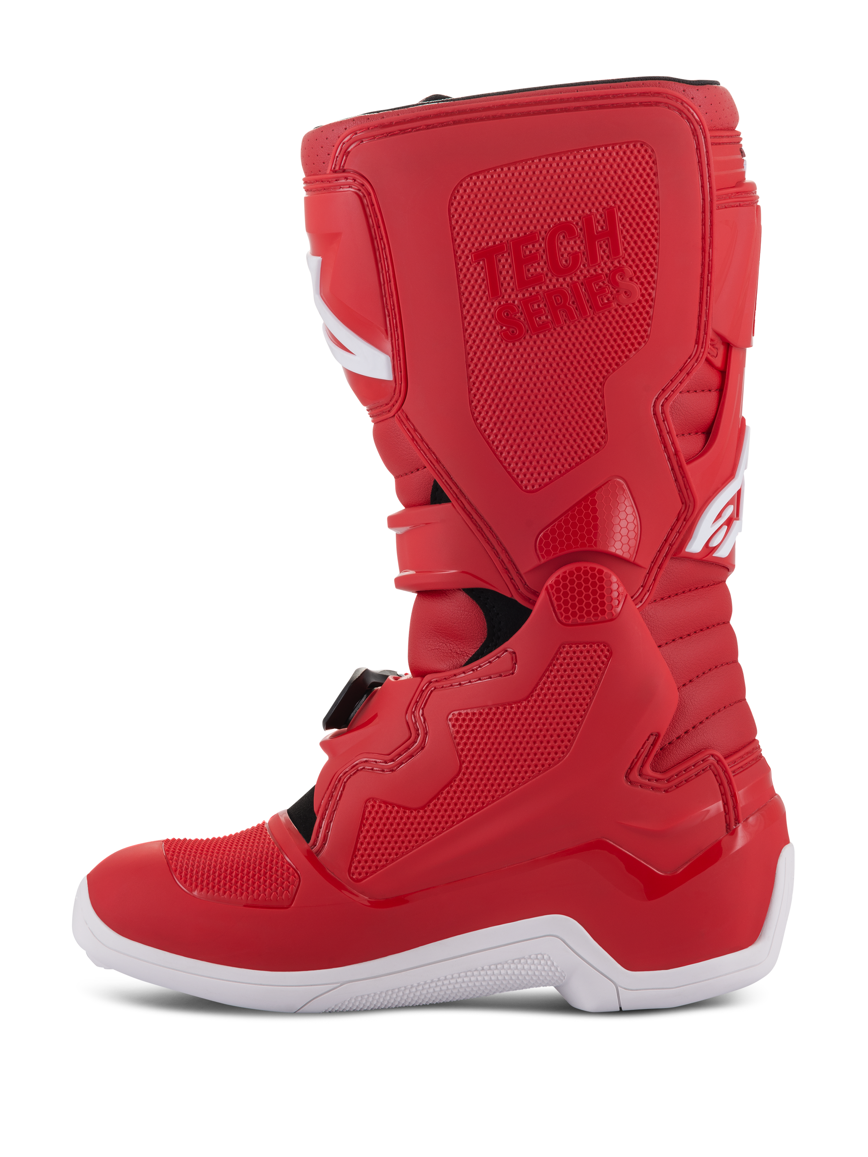 Bottes Alpinestars Youth Tech 7S, bottes de motocross pour enfant, rouge, avec semelle blanche, panneaux renforcés en TPU, multiples fermetures à boucles et marquage 'TECH SERIES', conçues pour les jeunes pilotes tout-terrain