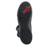 A pair of black/black XT-8 Gore-Tex high-top adventure enduro boots by Alpinestars EU, featuring red detailing. These boots boast a reinforced design with protective buckles and a rugged sole for enhanced grip. The Alpinestars logo is visible on the side, and the durable material makes them perfect for off-road riding.