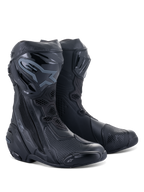 Alpinestars Supertech R Boots, Motorcycle Racing Boots, Black on Black, featuring protective TPU shin plates, replaceable sliders, and a streamlined performance design for road and track riding.