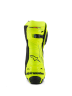 Bottes Alpinestars Supertech R, bottes de course de moto, jaune fluo et noir, vue arrière présentant une protection de talon renforcée, une fermeture réglable au mollet et un marquage distinctif, finition fluorescente haute visibilité pour la performance sur piste et sur route