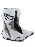 Bottes Alpinestars Supertech R Vented, bottes de moto de course, blanc, gris moyen et noir, dotées d'une construction en microfibre perforée pour la circulation de l'air, plaque de tibia en TPU avec logo Alpinestars et sliders remplaçables, design professionnel pour la piste