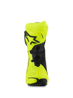 Alpinestars Supertech R Vented Boots, bottes de course moto, jaune fluo et noir, vue de face avec microfibre perforée, plaque de tibia en TPU avec logo étoile noir et maille de ventilation pour un flux d'air maximal.