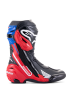 Alpinestars Honda Supertech R laarzen, race-motorlaarzen, zwart met felrood en blauw, voorzien van wit Honda-logo op het rode zijpaneel, Alpinestars-logo op de scheenplaat, blauwe bovenste gaiter, gestroomlijnd aerodynamisch ontwerp met geavanceerde TPU-bescherming