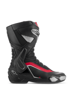 Alpinestars SMX-6 V3 laarzen, motorracelaarzen, zwart, zilver en rood, zijaanzicht met laterale TPU-enkelbrace, vervangbare teenslider en mesh flex-zones voor circuit- en straatgebruik.