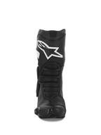 Bottes Alpinestars Stella SMX-6 V3, bottes de moto pour femme, noir et blanc, vue frontale montrant le logo Alpinestars blanc sur le tibia, protection TPU et panneaux de flexion ergonomiques, conçues pour la performance sur piste et sur route