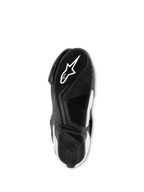 Alpinestars SMX S Stiefel, Schwarz und Weiß, Unteransicht der exklusiven Gummimischungssohle mit weißem Astar-Logo und texturiertem Profilmuster für Traktion und Halt.