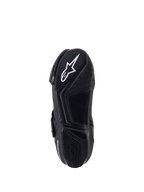Bottines ventilées Alpinestars SMX-1 R V2, vue de dessous de la semelle, noires, logo étoile Alpinestars blanc sur semelle en composé de caoutchouc texturé avec motifs d'adhérence avancés