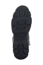 Bottes Alpinestars Ava pour femme, noir, vue de dessous montrant la semelle en caoutchouc robuste et épaisse avec motif de traction texturé pour l'adhérence, design de chaussures de moto urbaines