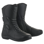 Bottes Alpinestars Origin Drystar®, bottes de moto touring noires, tige en microfibre avec zones de flexion en accordéon à l'avant, logo Alpinestars embossé sur le mollet, renfort de sélecteur synthétique, design imperméable épuré pour la route et l'aventure