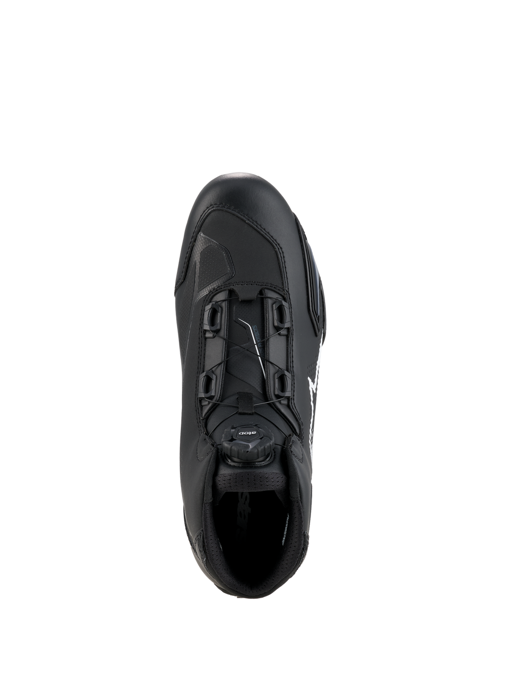 Chaussures Alpinestars Celer, noir et blanc, vue de dessus mettant en évidence le cadran du système de fermeture Rotor, construction en microfibre technique et silhouette de conduite sportive épurée.