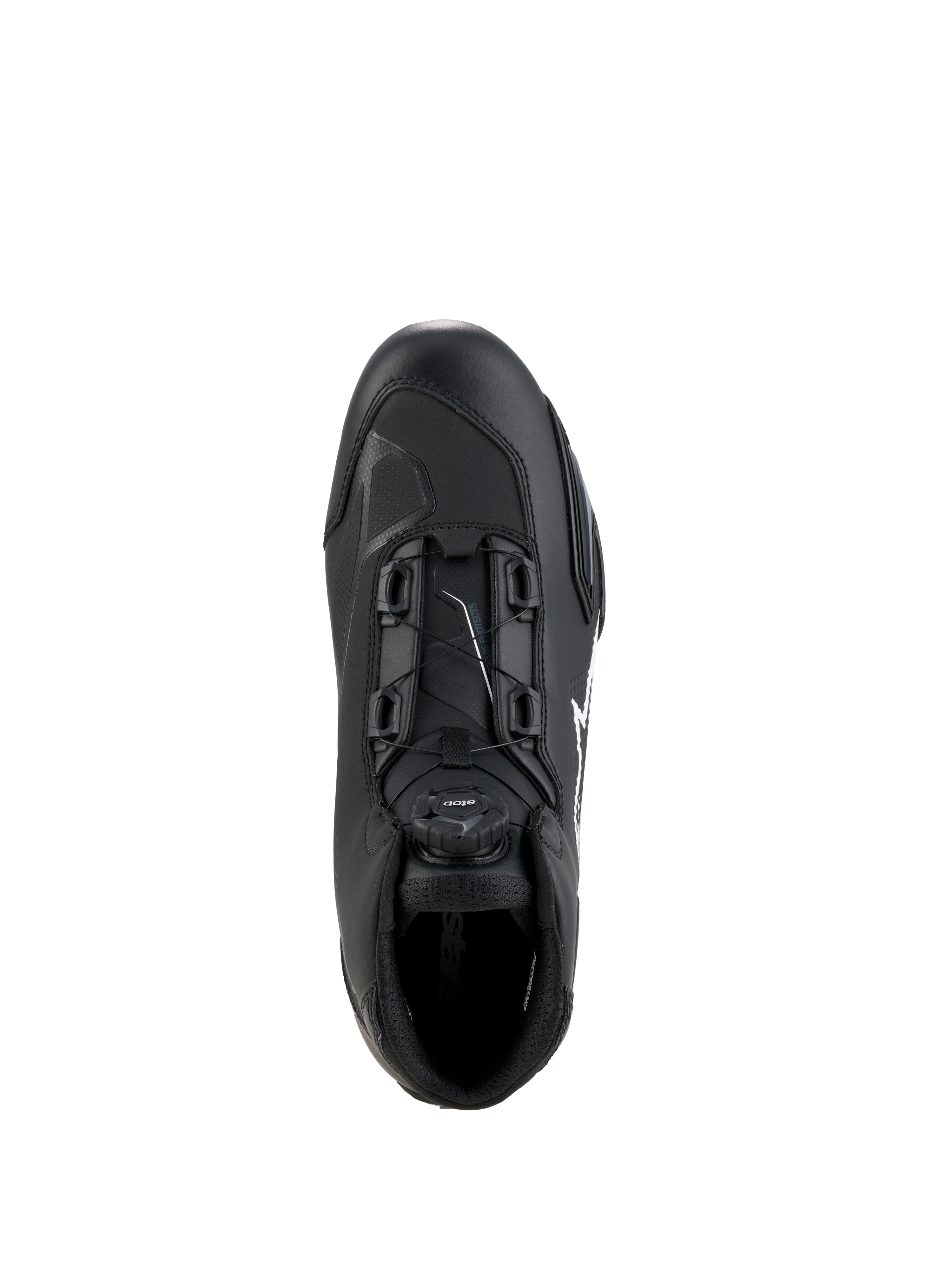Chaussures Alpinestars Celer, noir et blanc, vue de dessus mettant en évidence le cadran du système de fermeture Rotor, construction en microfibre technique et silhouette de conduite sportive épurée.