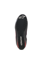 Alpinestars Celer Superair Shoes, Motorcycle Riding Shoes, Black and Bright Red, bottom view showing the black oil-resistant rubber outsole with a textured wavy grip pattern and white Alpinestars branding on the toe and heel