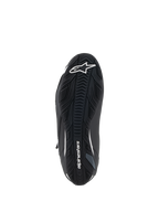 Chaussures Alpinestars Faster-4, chaussures de moto, noir et blanc, vue de la semelle en caoutchouc texturé avec logo étoile Alpinestars blanc sur la pointe et lettrage sur la voûte plantaire, semelle extérieure axée sur l'adhérence pour la performance sur route