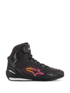 Chaussures Alpinestars Stella Faster-3 Rideknit® pour femme, chaussures de moto, noir, jaune et rose, vue de profil avec tige en maille respirante, logo étoile en dégradé éclatant et sangle de cheville à scratch.