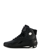 Chaussures Alpinestars Stella Faster-4 Drystar® pour femme, noir et argent, vue de profil, chaussures de moto imperméables avec tige en microfibre, fermeture à lacets et sangle auto-agrippante, logo Drystar et logo argenté à la cheville.