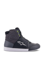 Alpinestars Chrome Drystar schoenen, urban motorrij-sneakers in zwart, donkergrijs en neongeel, met panelen van premium leer en suède, witte zool, neongele veters en kenmerkend sterlogo