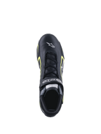 Chaussures Alpinestars Tech-1 T V3 FIA, chaussures de course automobile, noir et jaune fluo, vue de dessus montrant la construction en cuir, fermeture à lacets et logo Alpinestars blanc sur la pointe.
