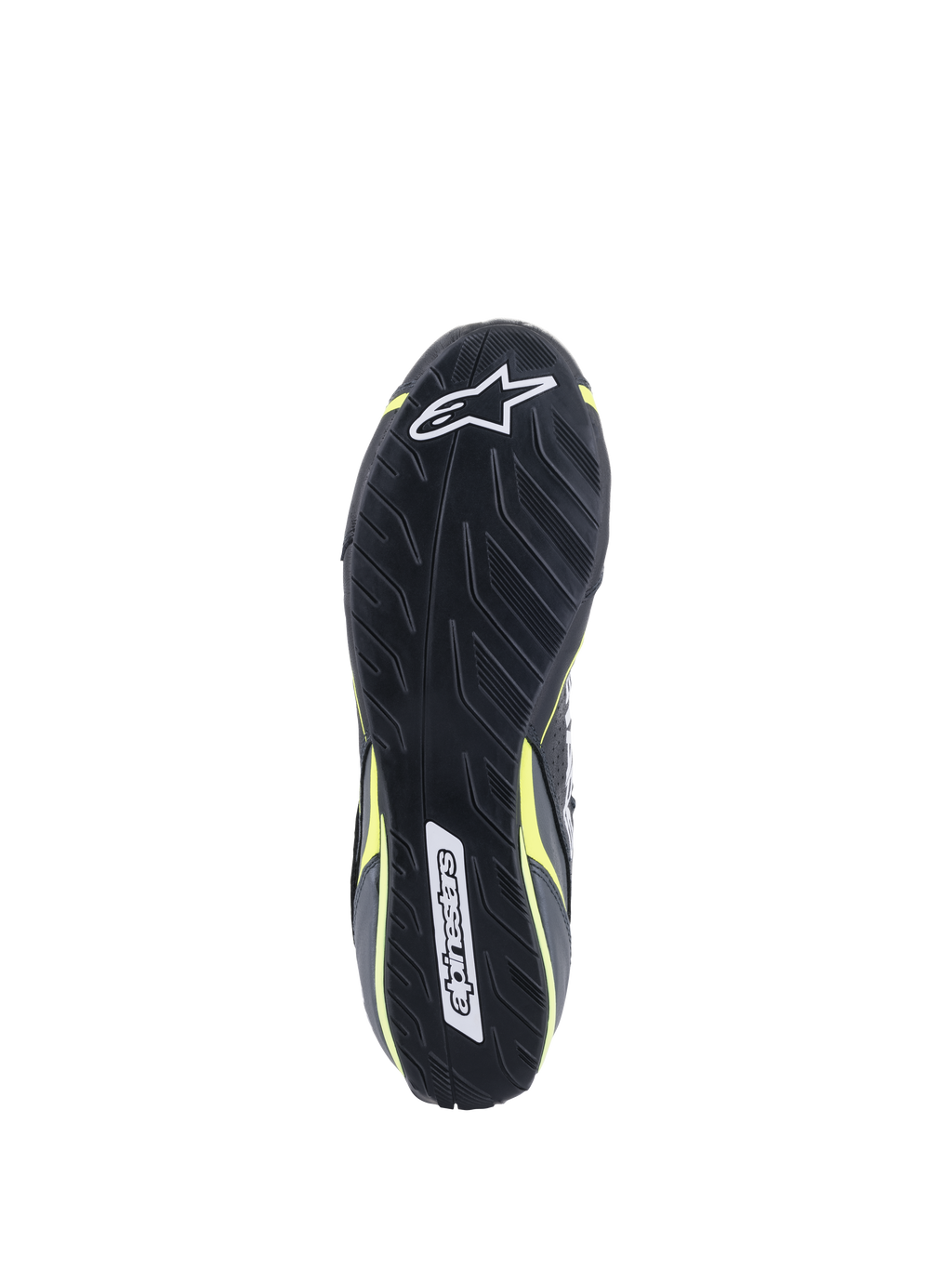 Alpinestars Tech-1 T V3 Shoes FIA, vue de la semelle extérieure, noir avec accents Jaune Fluo, semelle en caoutchouc asymétrique inspirée par la bande de roulement de pneus, avec logos Alpinestars et motif texturé pour la sensibilité aux pédales et l'adhérence.