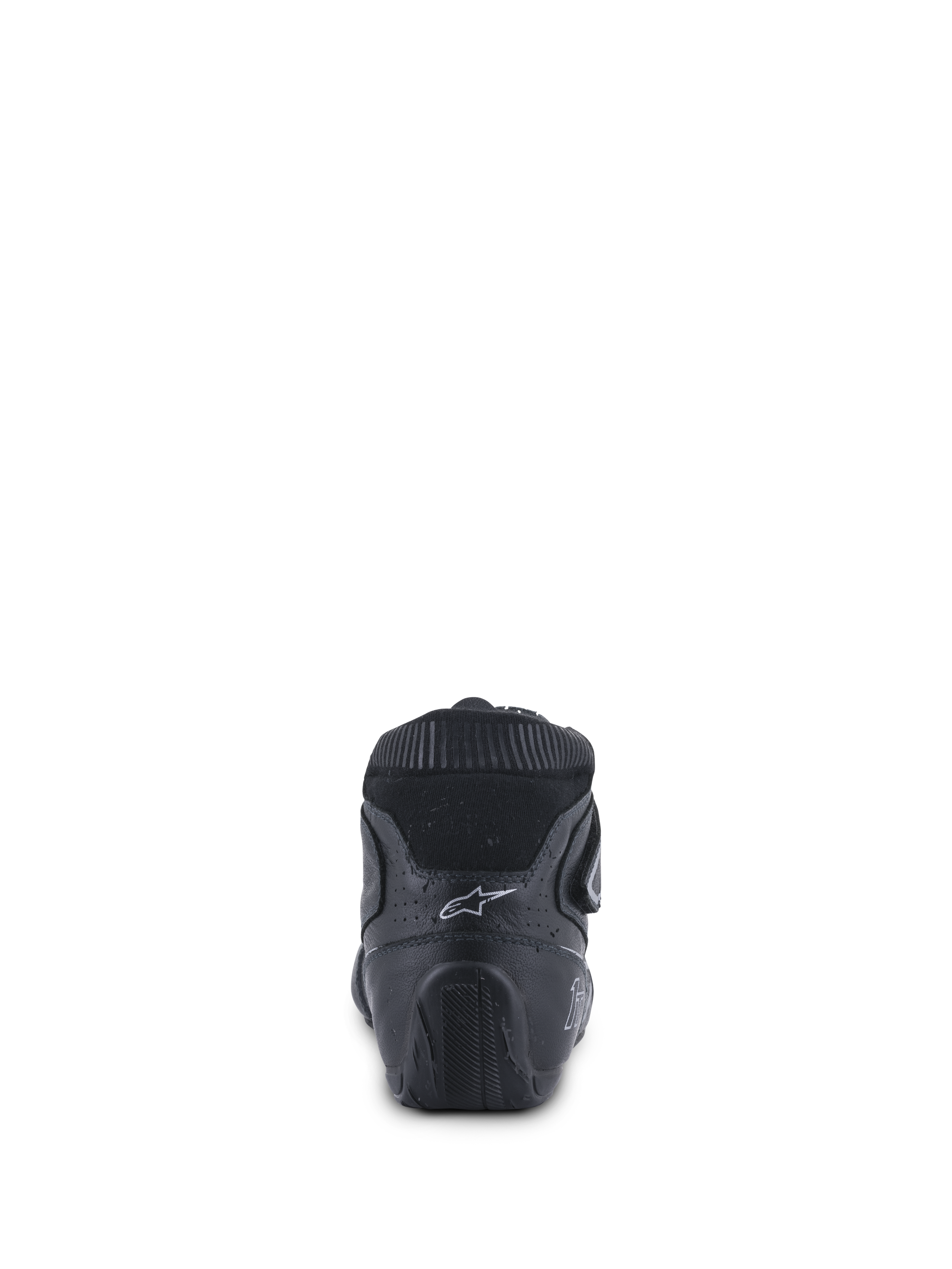 Alpinestars Tech-1 T V3 FIA, chaussures de course automobile, noir et argent, vue arrière montrant le contrefort de talon ergonomique, le logo Astars blanc et la semelle en caoutchouc texturée conçue pour le contrôle des pédales.
