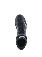 Alpinestars Tech-1 T V3 Shoes FIA, chaussures de course automobile, noir et argent, vue de dessus montrant le système de laçage et la sangle à crochet et boucle, cuir de bovin intégral avec logo étoile blanc sur le bout, équipement professionnel de sport automobile.