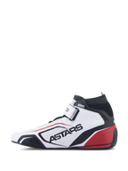 Chaussures Alpinestars Tech-1 T V3 FIA, chaussures de course automobile professionnelles, blanc, noir et rouge, vue de profil présentant le marquage ASTARS sur cuir perforé, col ignifugé noir et accents rouges au talon, design de sport automobile haute performance