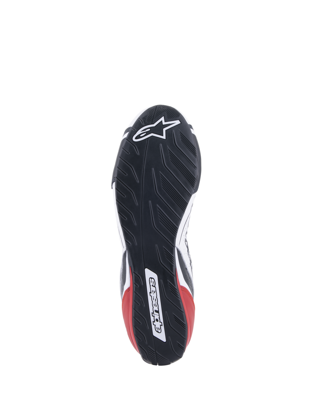 Chaussures Alpinestars Tech-1 T V3 FIA, chaussures de course automobile, blanc, noir et rouge, vue détaillée de la semelle en caoutchouc asymétrique inspirée de la bande de roulement d'un pneu, avec le logo et le lettrage Alpinestars, semelle extérieure résistante à l'huile et hydrofuge