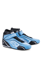 Chaussures Alpinestars Tech-1 T V3 FIA, chaussures de course automobile, bleu clair, noir et blanc, construction en cuir de bovin avec sangle à crochet et boucle et fermeture à lacets, arborant le logo étoile blanc et le marquage Alpinestars, chaussures de sport automobile professionnelles