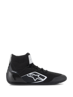 Chaussures Alpinestars Supertech, chaussures de course automobile certifiées FIA/SFI, noires avec logo étoile Alpinestars blanc, design montant avec tige tricotée et coque de talon en fibre de carbone, chaussures de sport automobile professionnelles